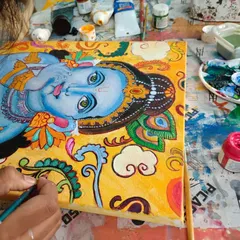 A student brings a vibrant Kerala mural to life, brushstroke by brushstroke. Our Indian folk art classes break down these timeless traditions, making them accessible and enjoyable for everyone to learn.