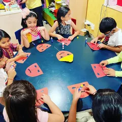 Children working together to create their Ravan masks. Crafting is a central part of how we celebrate festivals at The Reading Room.