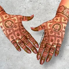 A beautiful back-hand design featuring a grid or "jaali" pattern with a central lotus mandala. The combination of geometric structure and floral softness is simply stunning.