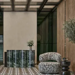 The reception area is the first impression of your company. For this Kolkata office, we designed a calm, sophisticated lobby using a fluted green marble desk, patterned flooring, and an abstract armchair to create a welcoming yet impressive entrance for visitors.