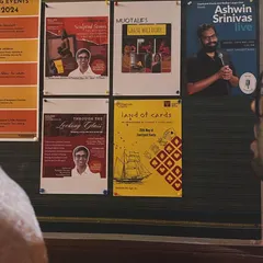 A view of our event board, where posters for upcoming shows are displayed. It's always exciting to see the month's diverse lineup of music, theatre, and comedy all in one place.