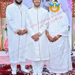 I was very humbled to make these coordinated clothes for a father and son on the occasion of the son's Misaaq Jaman. The son's outfit is a more formal sherwani style, while the father's is a matching saya kurta, creating a beautiful and respectful pairing.