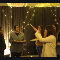 Behind every great performance are hours of practice and teamwork. Here, we are working with the bridesmaids, using props like diyas to perfect their entry and add a traditional touch to their sangeet dance.