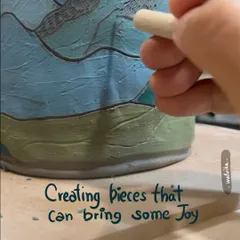 Carving a mountain landscape onto a large vase. This is how I transfer my love for the mountains onto my ceramic pieces, one line at a time.