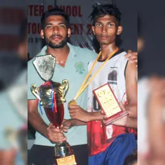 With one of my star players from the U-19 Boys team after their Gold medal victory. His hard work paid off, and I couldn't be prouder.