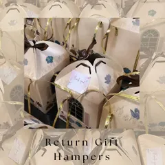 Elegant house-shaped boxes make for unique return gift hampers. These are perfect for housewarming parties or any event where you want to give guests a memorable token of thanks.