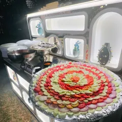 An artfully arranged salad platter, with concentric circles of cucumber, tomato, and onion. I believe even the simplest dishes should be presented beautifully.