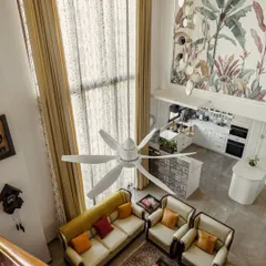 An overhead view of the living room from image 123, highlighting the open layout and double-height space.
