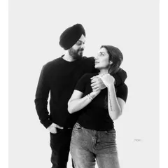Love in its most honest form. This black and white portrait focuses on the quiet, candid connection between two people, creating a memory that feels as real as the moment itself.