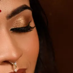 Another angle of the bronze eye makeup, showing the beautiful shimmer and clean application. I pay close attention to blending for a seamless finish.