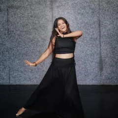 A moment of pure joy and expression during a contemporary dance session in my studio. This style focuses on fluid movements and emotional storytelling.