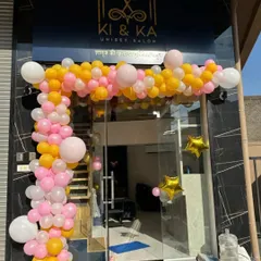 I provide cheerful and inviting decor for new business openings. This balloon arch for the Ki & Ka Unisex Salon uses a bright pink, yellow, and white color scheme to attract attention and celebrate their launch.