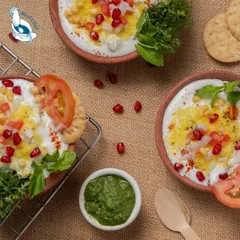 A rustic and flavorful Kullad Chaat, served in traditional clay pots. It's a vegetarian street food classic, elevated for your event.
