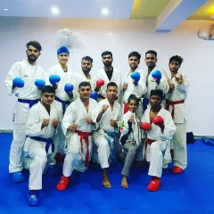 A group of our dedicated athletes at the dojo. We foster a strong team environment where both male and female players train together to achieve their personal best.