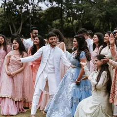 A snapshot from our own engagement entry. We wanted to create a fun, inclusive moment with all our cousins and friends, and we bring that same personal experience to your events.