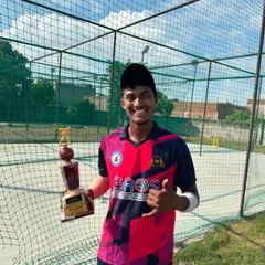 Celebrating Mayan Sharma's match-winning innings of 158 not out. This trophy is a reward for his relentless hard work and discipline in training.
