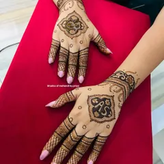 A personalized design for an engagement, featuring the couple's initials "AS" in a stylish monogram on the back of the hands.