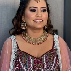 Her smile says it all. This engagement makeup is all about enhancing her happiness with a fresh, glowing base and beautifully defined eyes that sparkle.