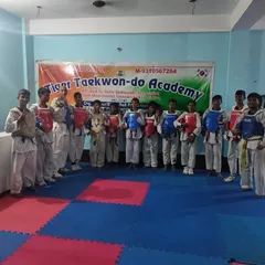 My team of students in their chest guards, ready for a session of fighting practice.