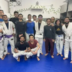 The team after putting in the work. This picture shows the diversity of our community, from new white belts to more experienced practitioners, all learning together.