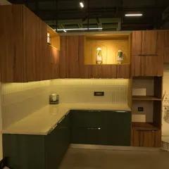 This kitchen setup at my Kolkata Experience Centre allows clients to interact with different finishes, from wood-grain laminates to glossy lacquered cabinets, and explore functional layouts.