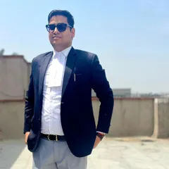 A confident stance in my professional attire. I am always ready to take on a case and argue with conviction.