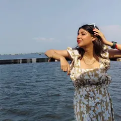 Another shot of the floral maxi dress, showing how it moves in the wind. It's the perfect piece for a relaxed and stylish getaway.