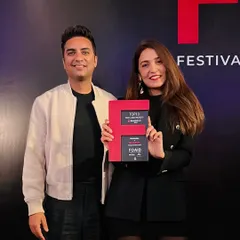 Posing with our FOAID award. This recognition, based on public appreciation, means the world to us. It’s a reminder from the universe to keep creating and sharing our passion.