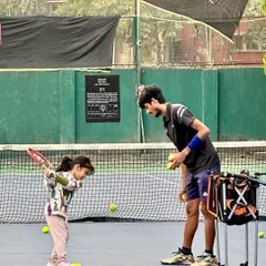 Enrolling children in sports is about more than just physical fitness. It builds confidence, teaches emotional management, and instills a discipline that they will carry with them for the rest of their lives. Here, I am working with one of our youngest players on her basic form.