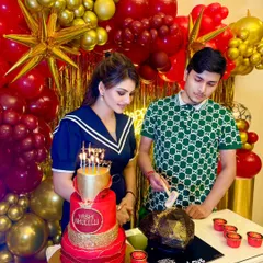 Actress Urvashi Rautela celebrating her brother Yashraj's birthday. We designed a lavish red and gold themed dessert table, including a grand three-tier cake and a custom smash cake, to match the party's opulent decor.