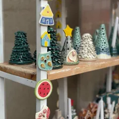 A collection of my quirky, hand-painted fridge magnets and miniature Christmas decor. I make these in small batches, featuring everything from tiny houses and owls to festive gnomes.