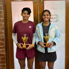 Durganshi Kumar and her partner with their trophies after finishing as the Runner-Up in the Women’s Doubles tournament in Chandigarh.