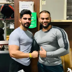 With my friend and fellow fitness enthusiast. We push each other to be better. One life, baby!