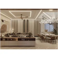 A wide view of the open-plan drawing and dining room. The space is unified by a consistent color palette, recessed ceiling lights, and a large, comfortable seating arrangement, making it ideal for hosting large gatherings.