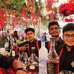 The Cheers Valley team behind the bar at a festive wedding event. We work together seamlessly to ensure your guests are served quickly and with a smile.