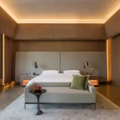 The Roseate Junior Suite is spacious and filled with natural light. It features a comfortable bedroom, a separate living area, and a luxurious bathroom for a truly relaxing stay.