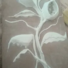 Here’s a look at the creative process. This is a student's work in progress, showing how we build the floral structure using a putty and POP mixture. This is the foundational step to creating that amazing 3D effect.