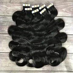 These jet-black tape-in extensions are styled into beautiful body waves, showcasing their versatility. They are made from 100% Remy human hair, so you can heat style them just like your own.