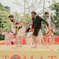 Pure, unadulterated fun during our La Tomatina Haldi. Guests and family members playfully engage in the tomato battle, creating moments of joy and laughter that redefine the traditional Haldi ceremony.
