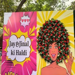 A custom Haldi photo booth with a pop-art twist. The illustration features a 3D floral afro, creating a fun and interactive spot for guests to capture memories.