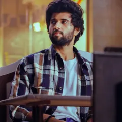 A casual moment from a Thums Up commercial with Vijay Deverakonda. I styled him in a classic plaid shirt over a white tee, creating a relatable and approachable look for this scene.