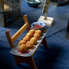 Our popular cheese balls, filled with gooey cheese and served hot and fresh with a sweet chili dip.