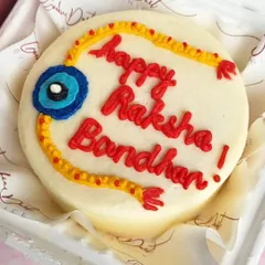 How cute is this egg-free bento cake for Rakshabandhan? It's the perfect small, personal gift to celebrate the bond with your sibling. I love how the simple rakhi design came out on the smooth cream cheese frosting. It’s a modern twist on a traditional celebration.