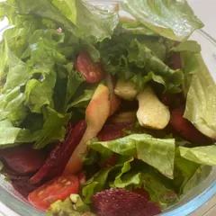 We love getting creative with our healthy salads. This refreshing mix includes crisp lettuce, sweet apple slices, and beetroot, offering a unique combination of flavors and nutrients.