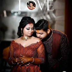 A romantic and intimate portrait from a reception. The groom's gentle kiss on her shoulder is a classic gesture of affection, captured in a way that feels both elegant and deeply personal.