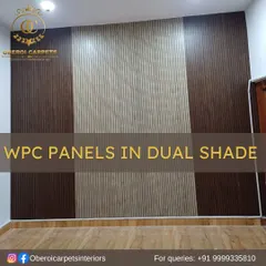 Create a unique look by combining different finishes. This feature wall uses a dual-shade design, pairing dark wood-grain WPC panels with a lighter, cream-colored fluted panel for a balanced and stylish contrast.