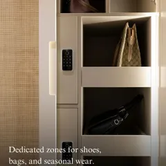 This custom wardrobe features dedicated compartments for handbags and multiple digital lockers for valuables. It’s about creating storage that is tailored to your specific needs and lifestyle.