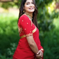 Mokshitha Pai in a classic red saree paired with a custom embroidered blouse from our studio. A timeless look for any festive occasion.