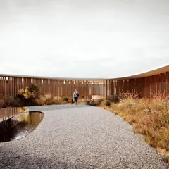 The internal courtyard of Amar Villa, featuring a tranquil water body and a walkway shielded by vertical wooden fins. This space offers a serene transition zone that balances privacy and openness.