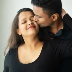 A gentle kiss on the cheek, a moment of pure affection. I focus on capturing these small, tender gestures that reveal the deep love between a couple.